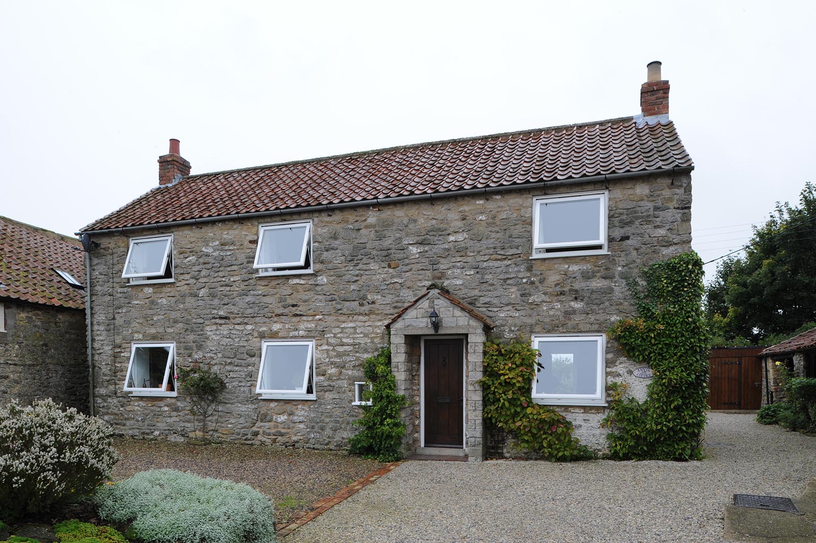 cottage with white windows